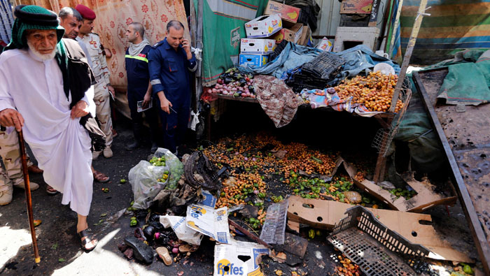 Bomb kills two in crowded Baghdad market