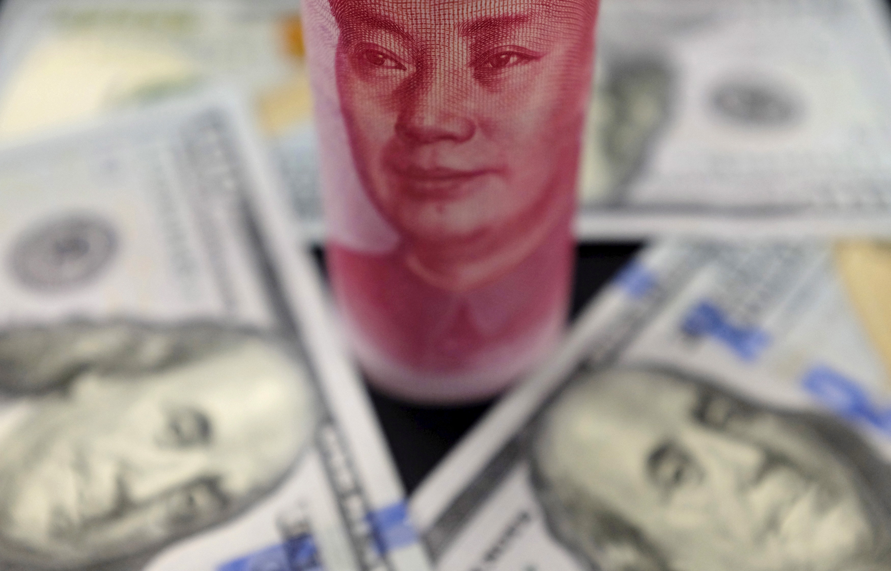 Yuan rises as China signals support, revives X-factor for fixing