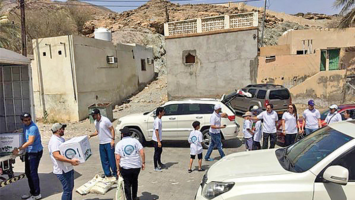 Holiday box giveaway helps 70 families in Muscat