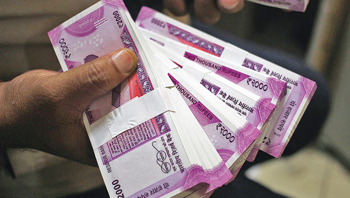 Slide of Indian rupee affects expatriate investors