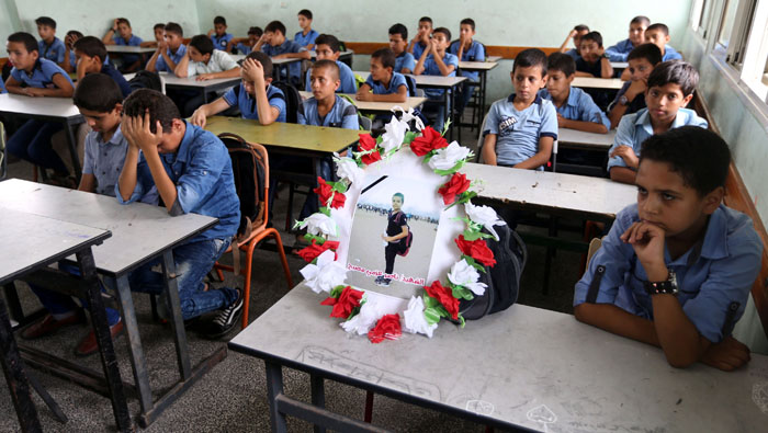 Classmates mourn boy shot dead by Israeli troops in Gaza border