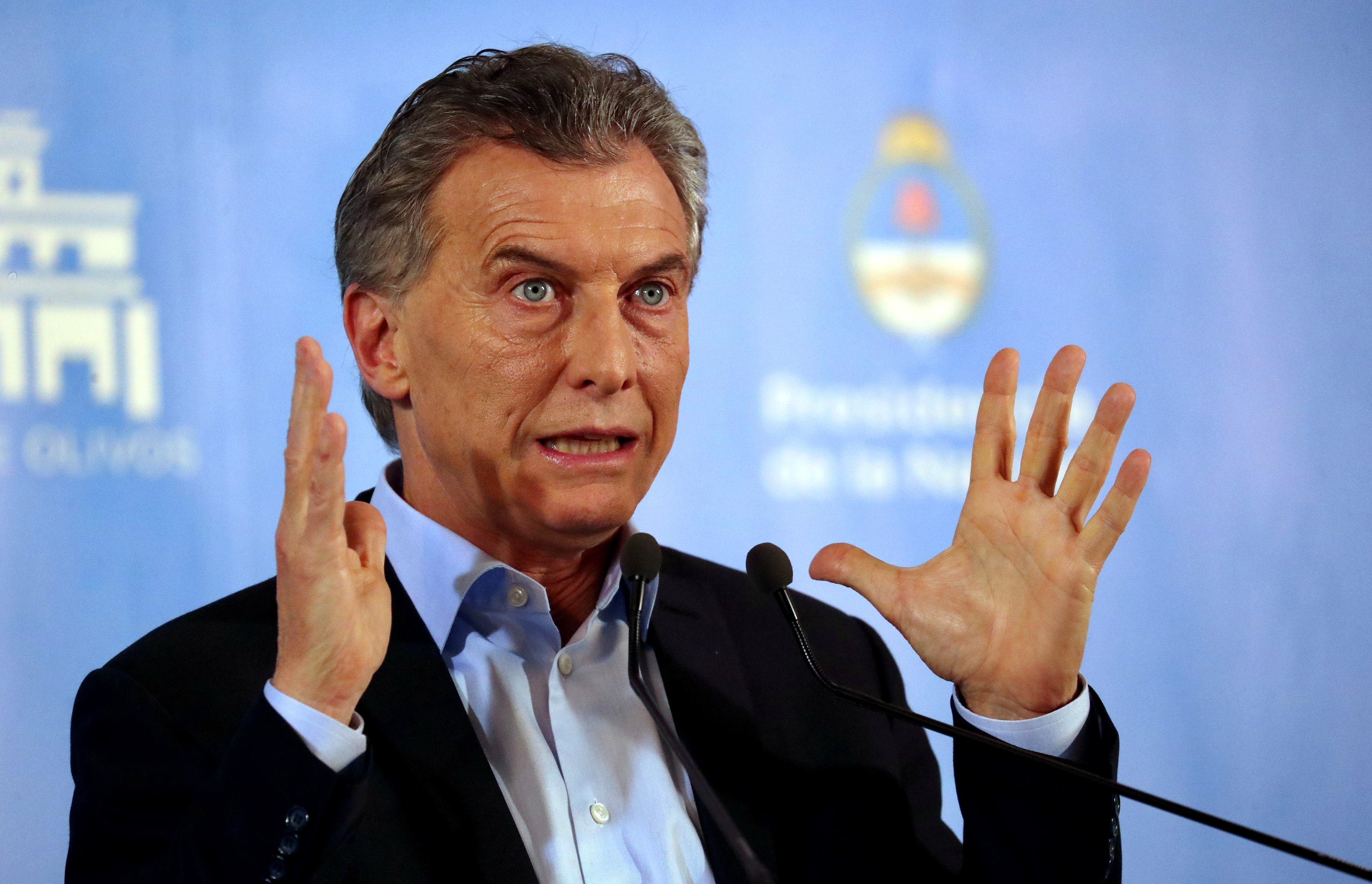 Argentina unveils 'emergency' austerity measures, grain export taxes