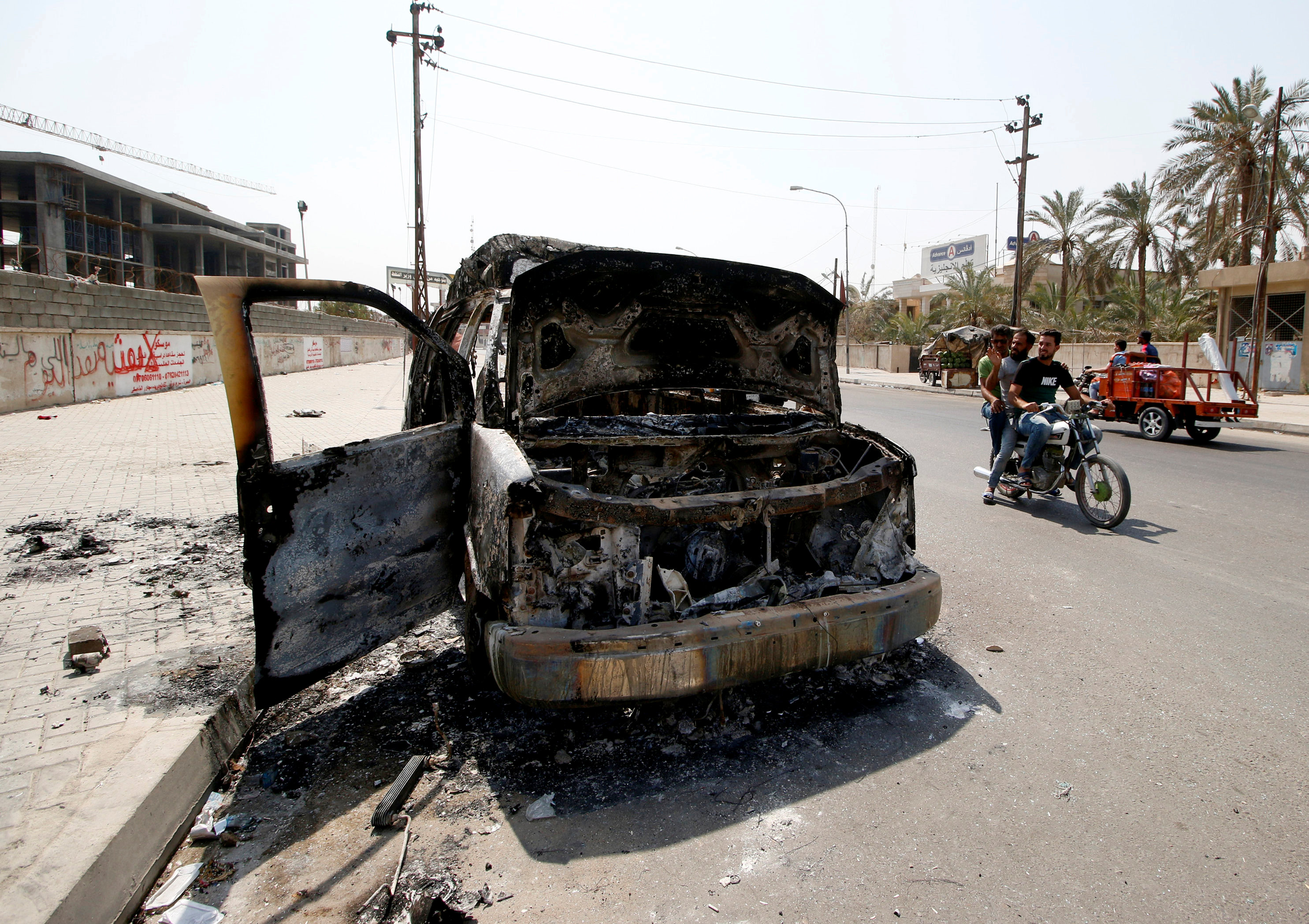 Basra airport targeted by rocket fire as protests grip Iraq