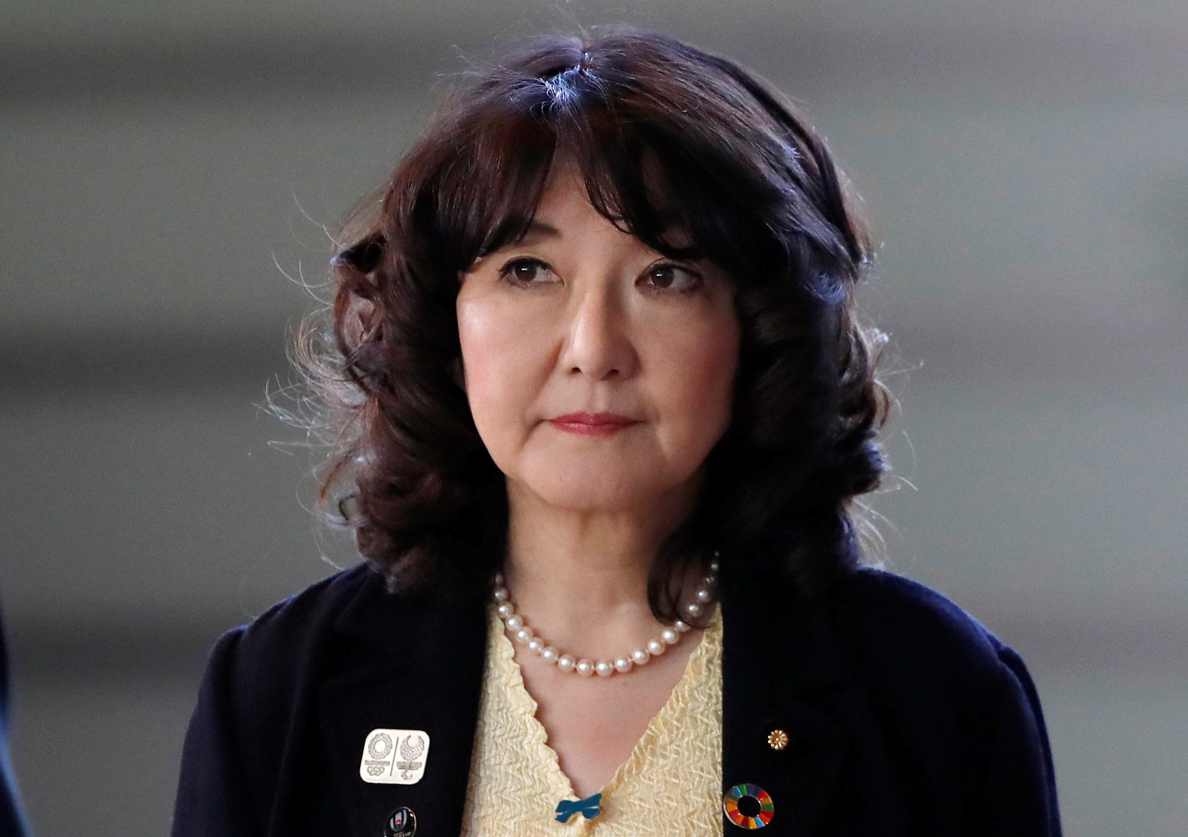Japan PM Abe keeps allies in key posts, just one woman in cabinet