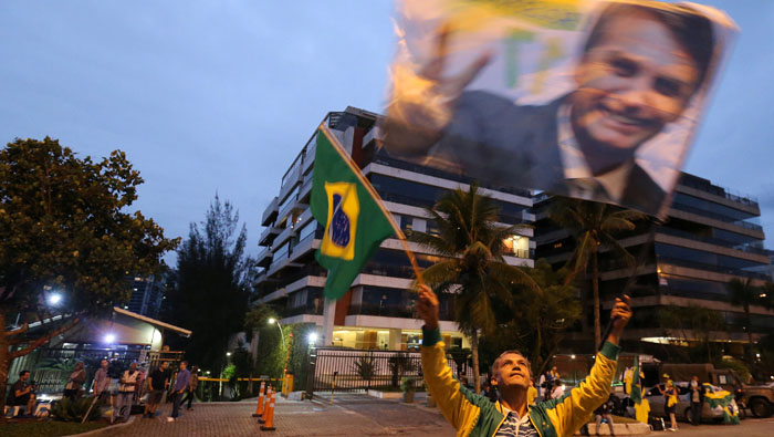 Brazil's far-right Bolsonaro grows lead with run-off victory in sight
