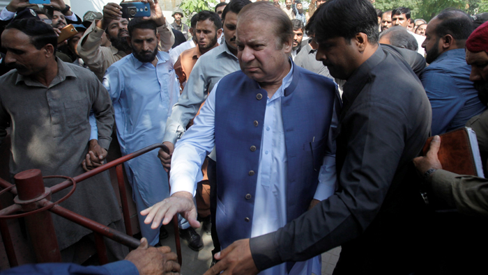 Two Pakistani ex-PMs, journalist face court in treason case
