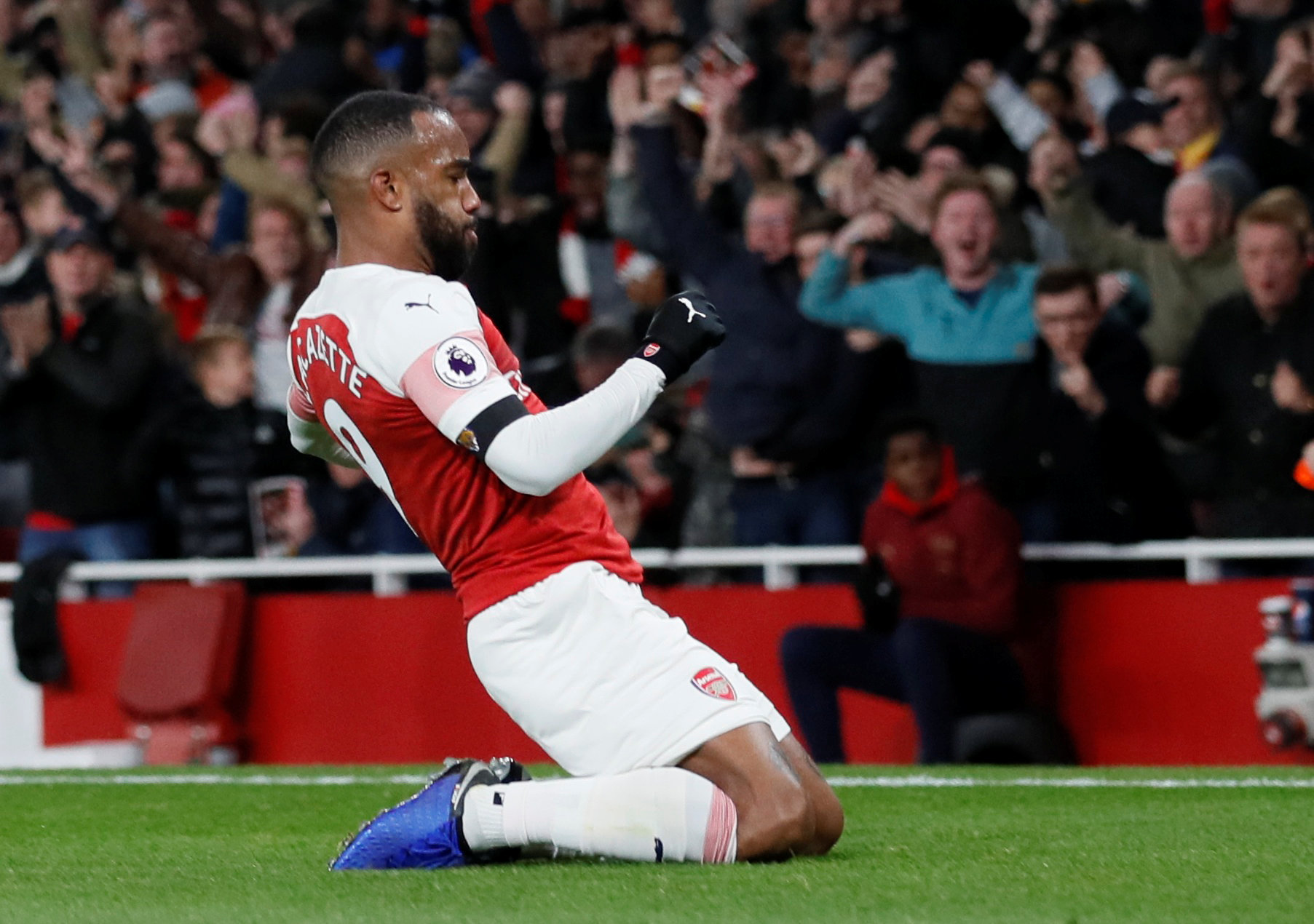 Football: Lacazette strikes late as Arsenal hold Liverpool