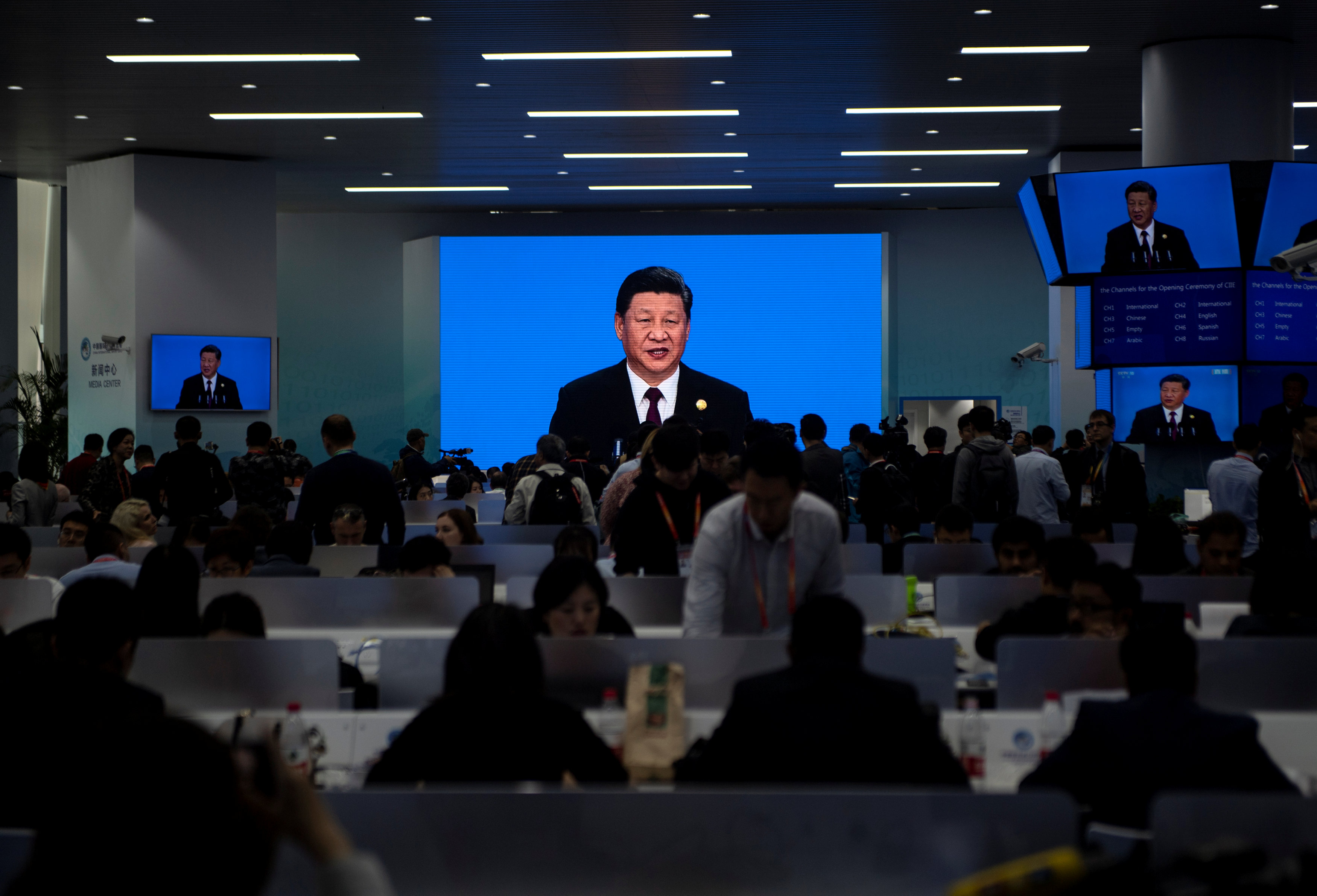 China's Xi promises lower tariffs, more imports