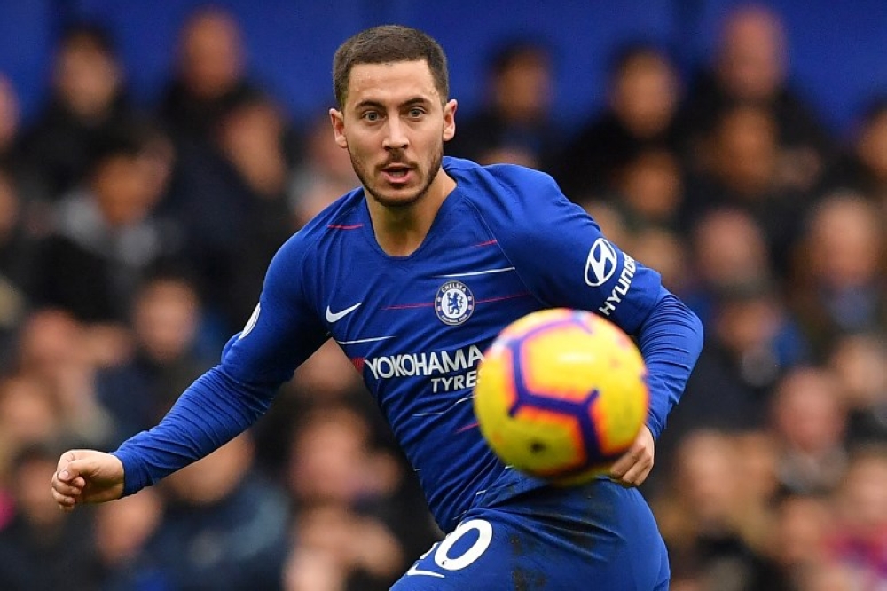 Football: Hazard wants to be a Chelsea 'legend' after hitting century mark