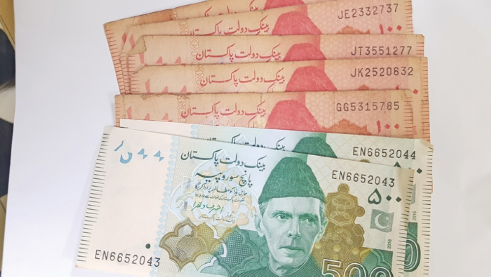 Pakistan rupee hits new low against Omani rial, Indian rupee stable