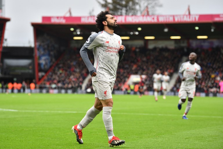 Football: Salah hat-trick sends Liverpool top, Man United finally hit form