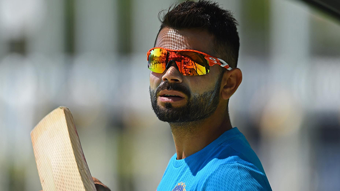 Cricket: Kohli brushes off injury fears as back 'niggles'