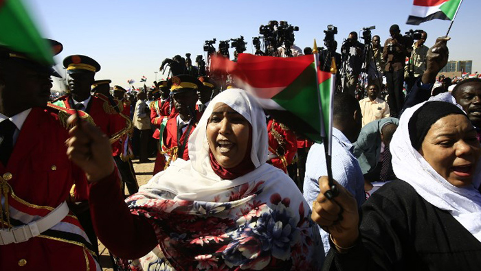 Crowds back Bashir at Sudan rally as police tear gas rival protest