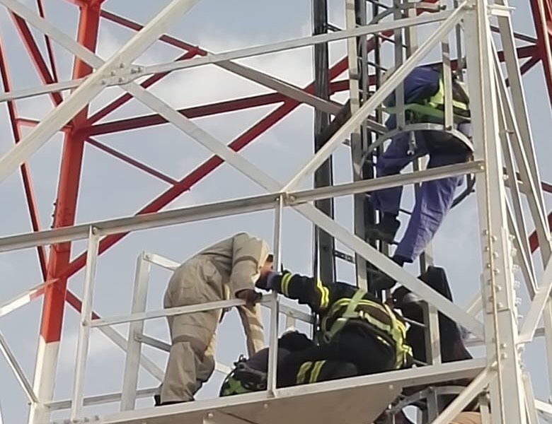 Worker who fainted at top of telecom tower rescued