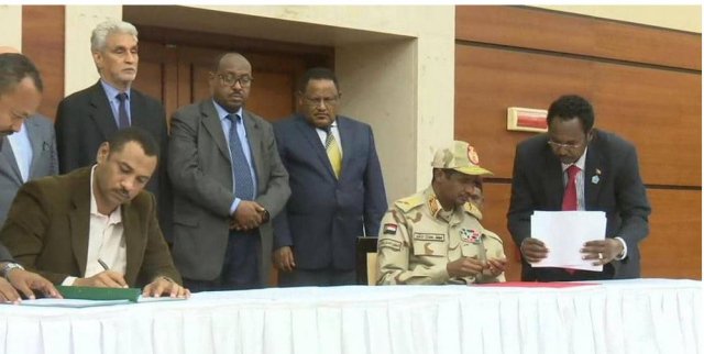 Sudan's military rulers, Opposition sign power-sharing accord