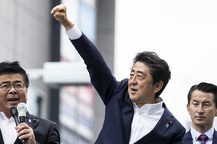 Japan's ruling coalition maintains majority in parliamentary elections