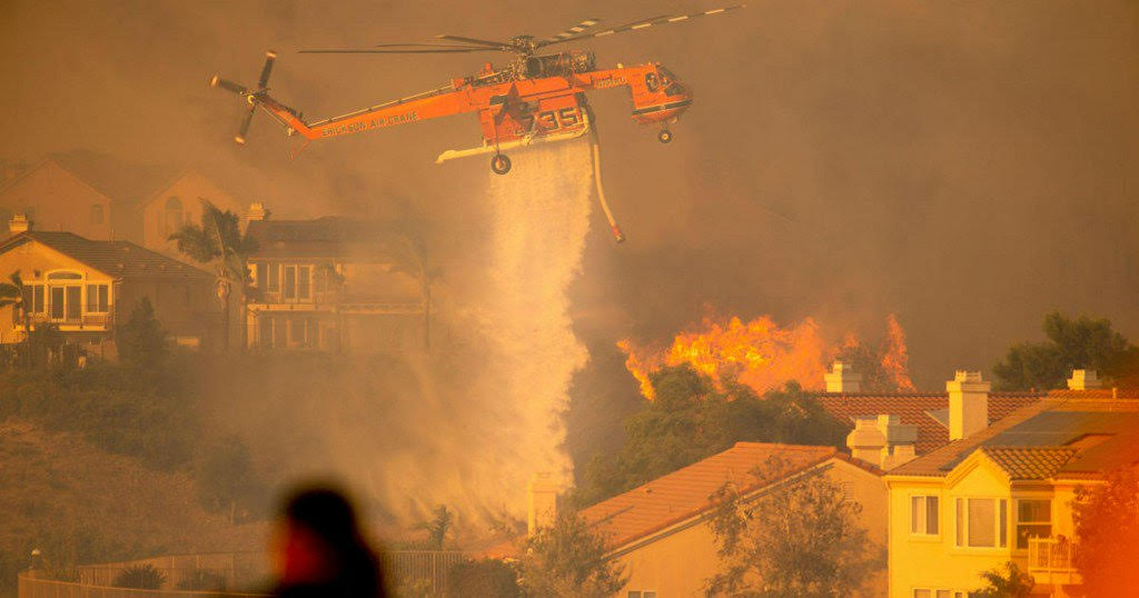 California continues to battle wildfires as officials warn residents of heavy smoke