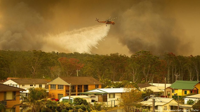 Australian bushfires turn deadly, destroy scores of homes
