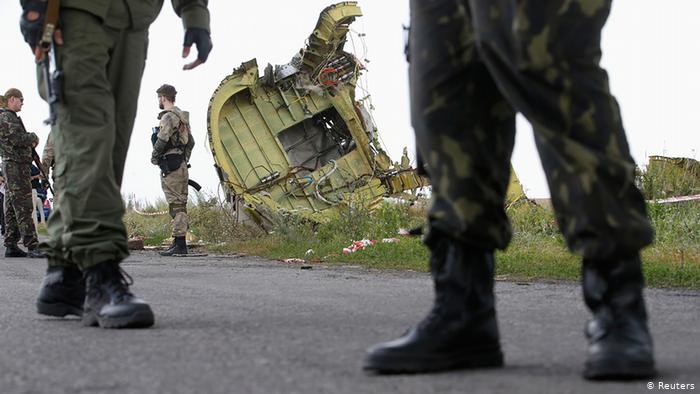 Flight MH17 families seek answers as suspects face trial in absentia