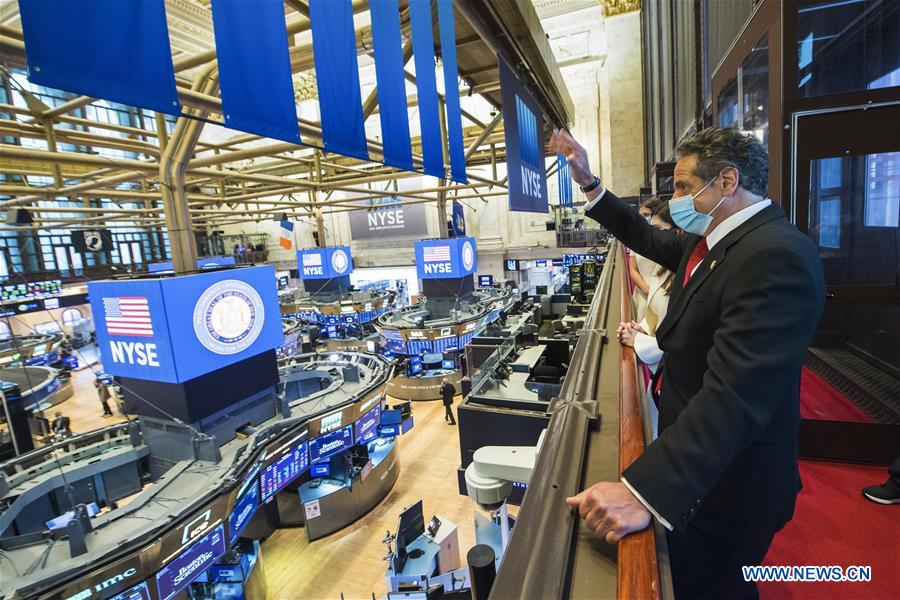 New York Stock Exchange partially reopens as US COVID-19 deaths near 100,000