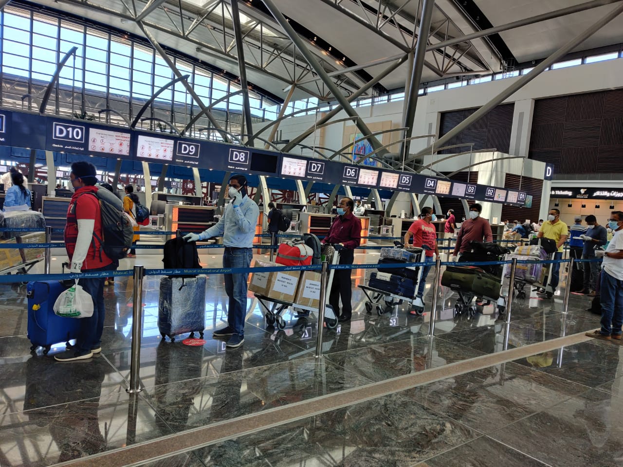 Omani, Indian expats return home on evacuation flights