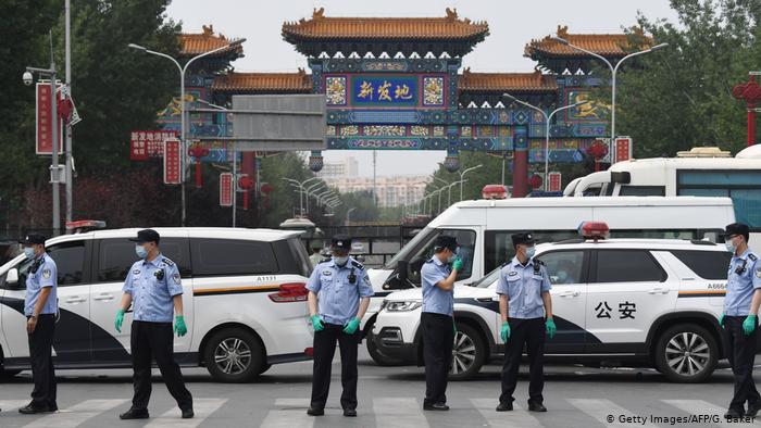 Beijing orders lockdown amid fresh outbreak