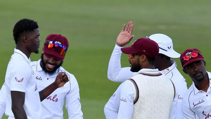 West Indies lose two quick wickets in chase of 200
