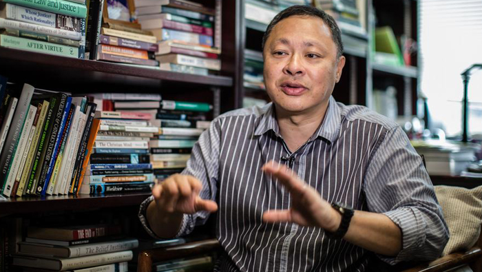 Hong Kong pro-democracy professor fired for 'doing evil'
