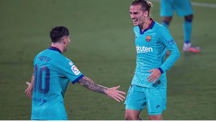 Barca keep title hopes alive after win over Villarreal