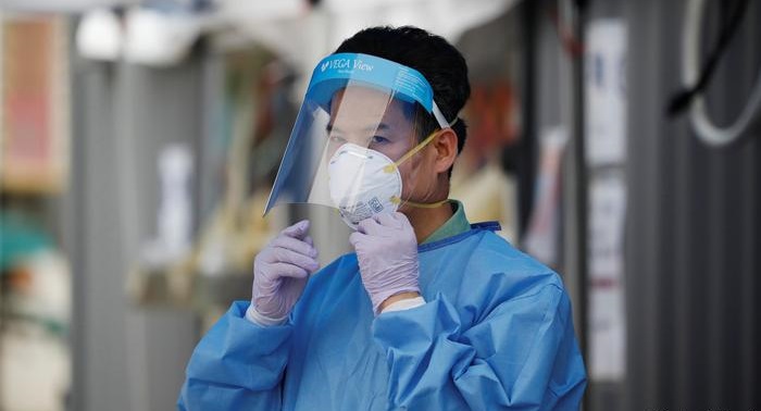 South Korean doctors strike as coronavirus cases spike