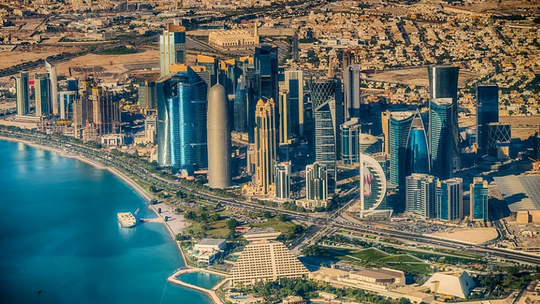 Qatar sets minimum wage, facilitates job change