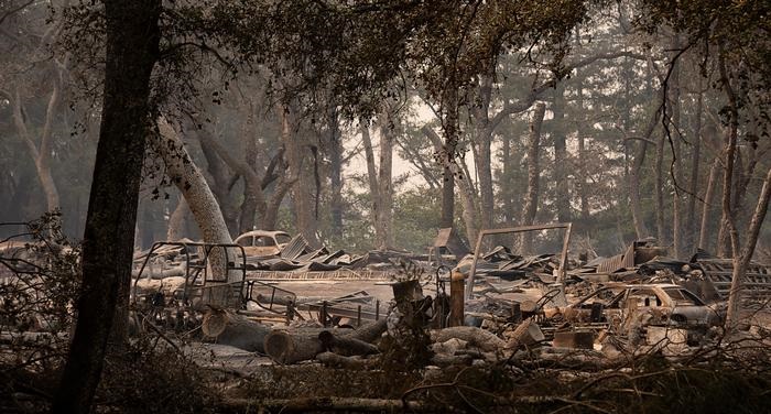 California wildfires kill 3, force tens of thousands to evacuate