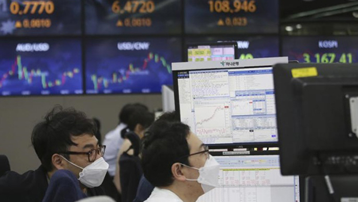 Asian shares slip on pandemic worries despite Wall Street rally