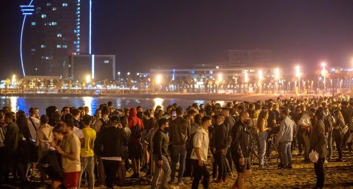 Spain celebrates end of COVID lockdown with street parties