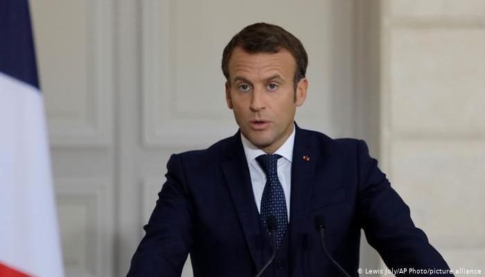 French President slapped by man in crowd, two arrested