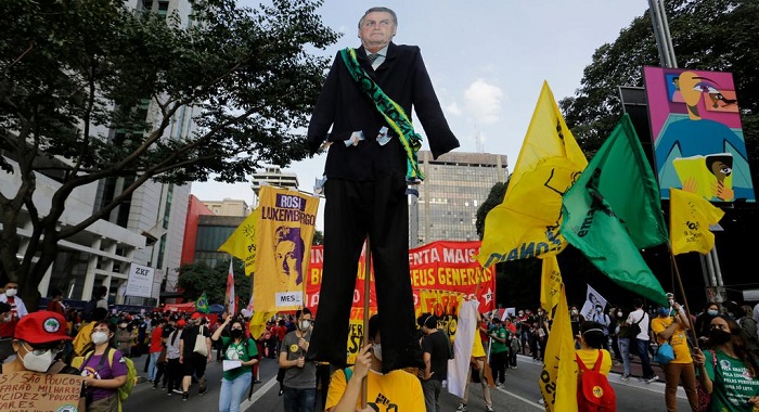 Protesters rally against Brazil's Bolsonaro amid COVID probe