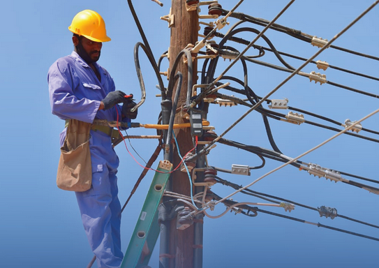 Volunteers inspect electricity connections in over 400 houses in Oman