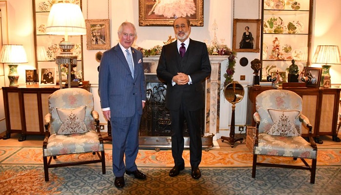 His Majesty talks to Prince Charles
