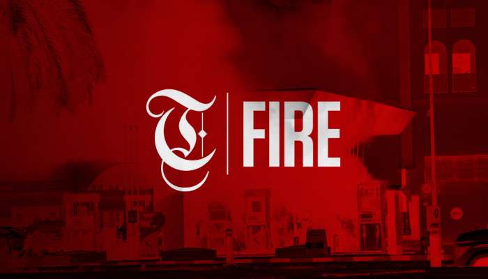 Wood waste storage area catches fire