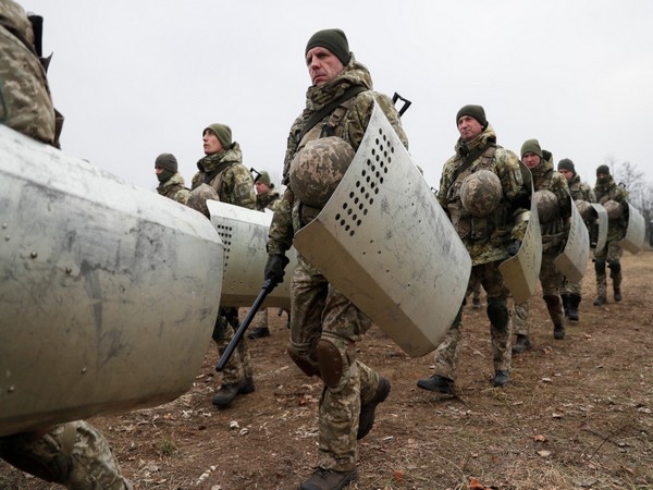 Russia says withdrawing armed forces from near Ukraine