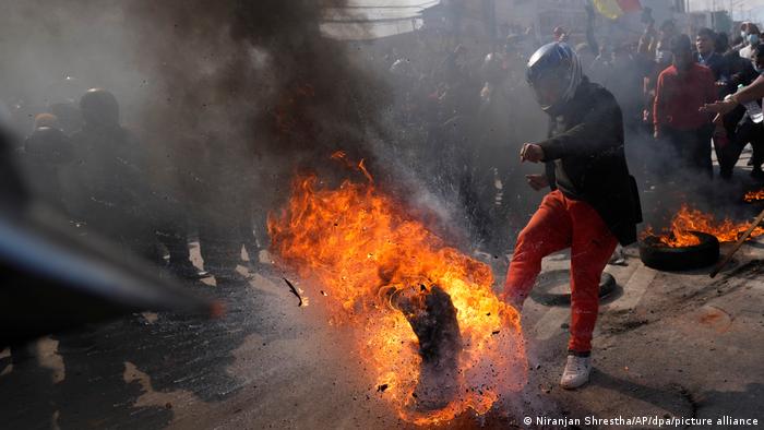 Nepal protest turns violent as lawmakers debate US grant