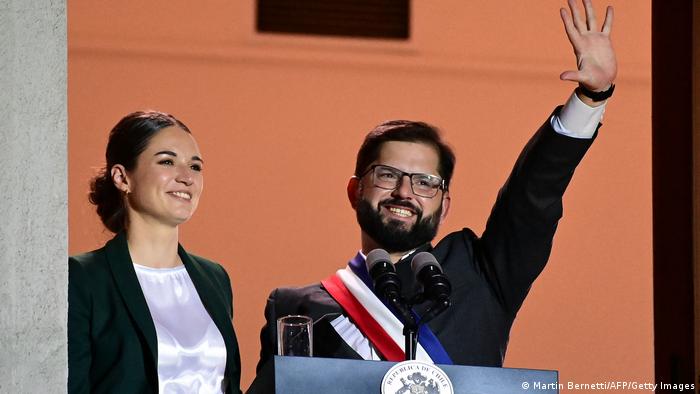 Chile swears in former student leader as youngest president