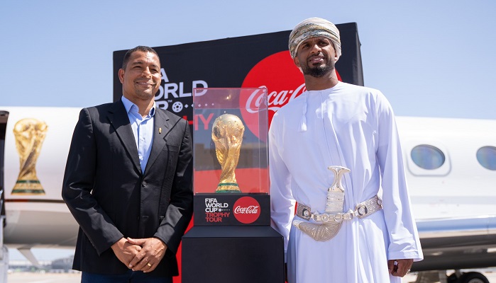 Oman's Ali Al Habsi greets FIFA World Cup trophy on arrival to the country