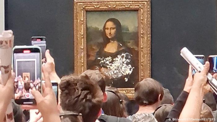 Louvre visitor smears cake on Mona Lisa exhibit