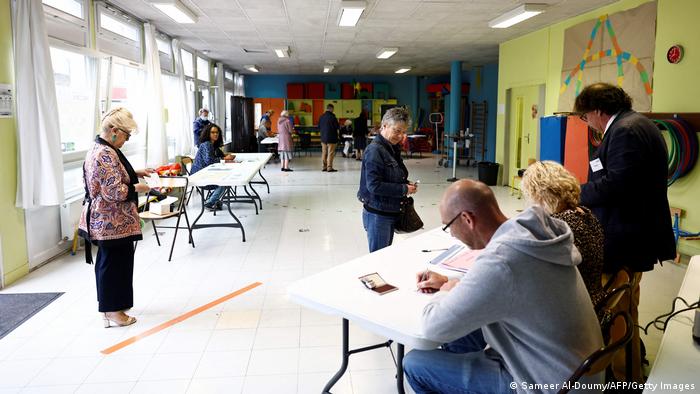 France votes in crucial second round of parliamentary elections
