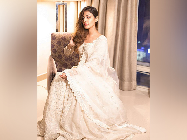 Rhea Chakraborty looks gorgeous in white lehenga