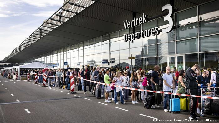 Amsterdam's overcrowded Schiphol airport cuts passenger numbers