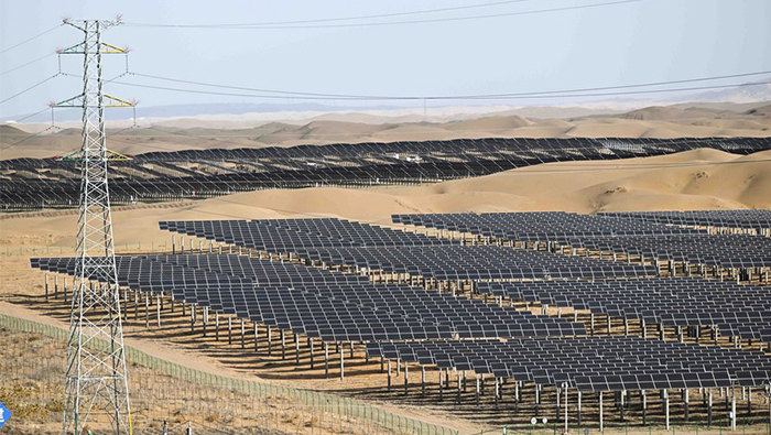 China builds vast solar, wind power parks in deserts