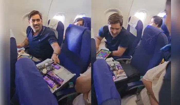 Check out how Dhoni reacted after air hostess served him chocolates with a note