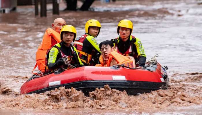 China floods: Over a dozen dead amid torrential rains